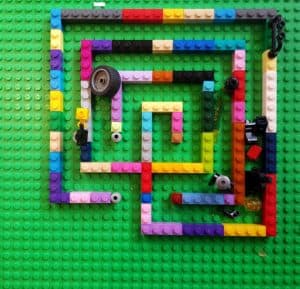 A top down view of a finger labyrinth created with lego bricks.